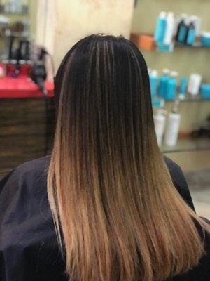 Balayage  by Leyla Straightened hair style.