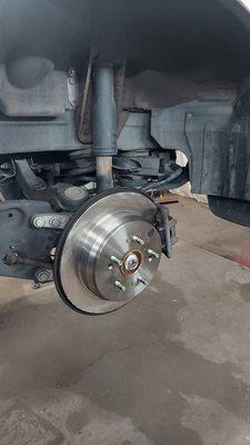 This break repair came with installation of an all new brake rotor and pads replacement.