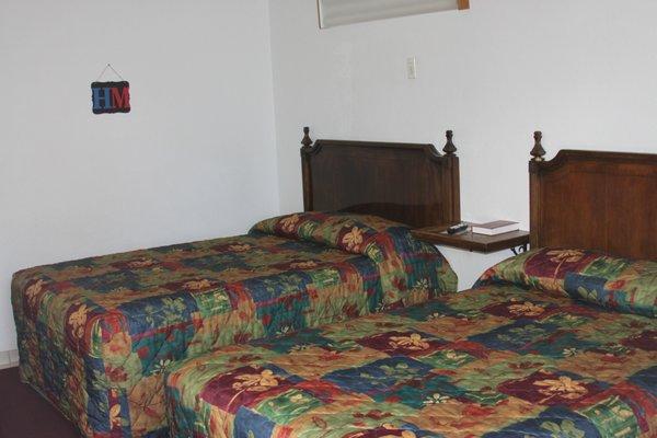 One of 6 rooms with 2 full size beds