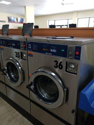 $2.00 machines fits 2  small laundry baskets of clothes according to machine.