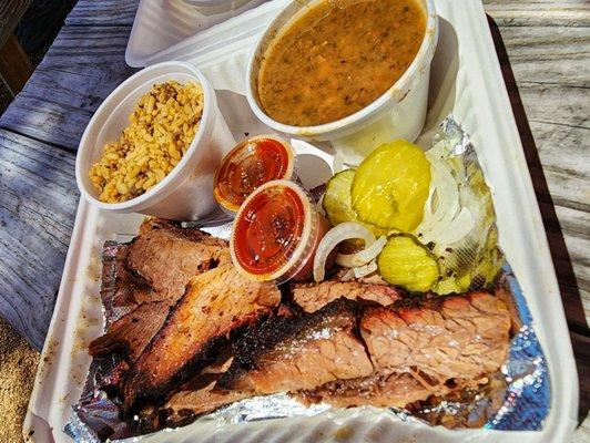 Brisket plate with Beans and dirty rice