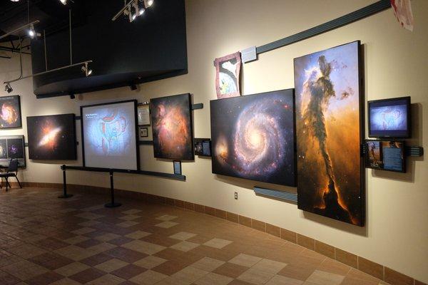 Explore the universe with frequently-updated displays in the Longway Planetarium lobby.