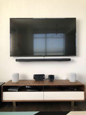 Routed the cables within the wall and also concealed the cable from the sound bar to the tv with a plastic conduit. Looks great!