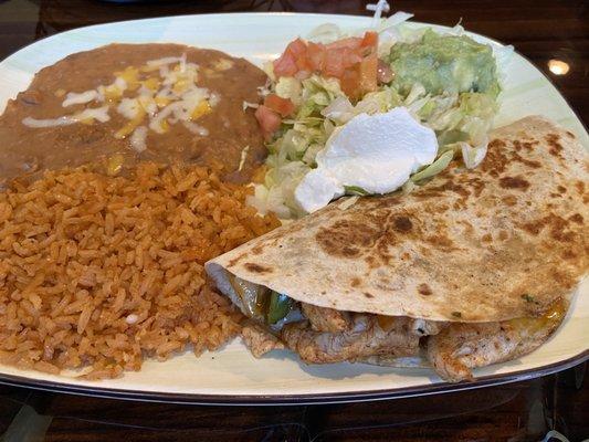 Fajita quesadilla with refried beans and rice