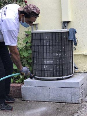 Roger cleaning AC