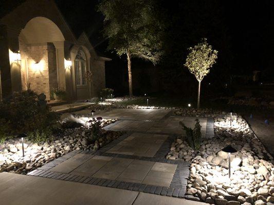 We love accent lighting and re-creating entry ways with pavers!