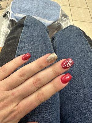 Better lighting, acrylic nail fill with Christmas theme.