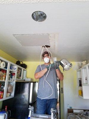 Installing a recessed lights in the kitchen,  remodelling