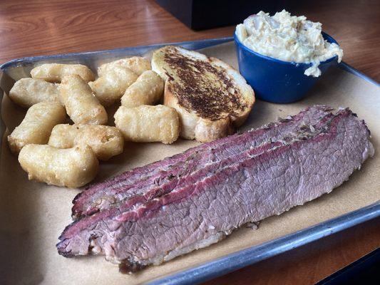 1 meat platter with brisket, Texas toast, potato salad, and Gouda bites