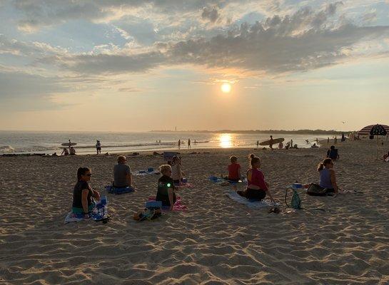 Sunset Yoga at the Cove Beach