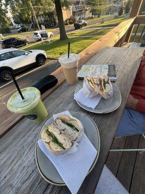 Turkey pesto sandwich, breakfast bagel sandwich, ices matcha with coconut milk, iced frothy pumpkin