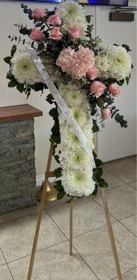 Cross sympathy flower arrangement