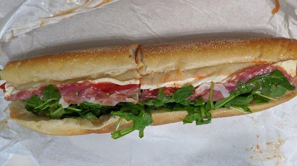 Italiano sub w/ soppressata, prosciutto, arugula, roasted red peppers & mozzarella. Full size! So yummy