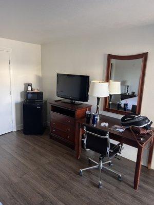 Refrigerator/microwave, 39" tv, dresser and desk, room 133