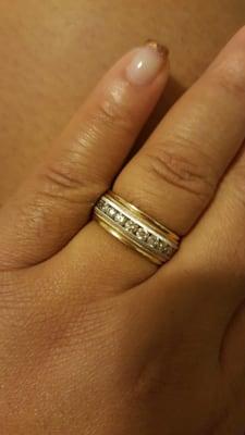 This is my fiance's wedding band as I tried it on to see how it looks....