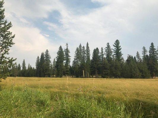 Land with open space, mountain views and an elevated ridge.