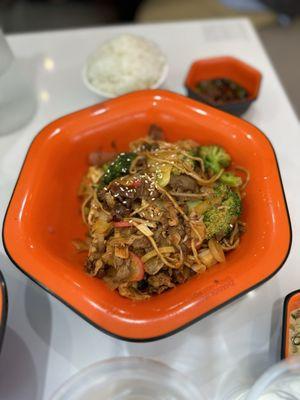 Lamb and veggies cooked in Sichuan peppercorn chili oil.