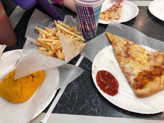 Beef patties , fries and regular slice all good and they have good combos