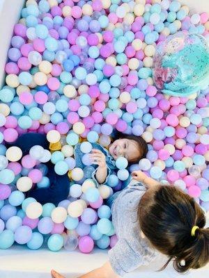 All giggles here in this ball pit