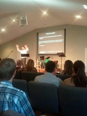 Pastor Scott preaching