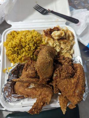 Fried Chicken Wings w/ rice and Mac and Cheese.