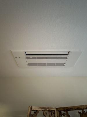 Indoor mini split ceiling cassette unit.