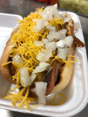 Hotdog with chili, cheese & raw onions.