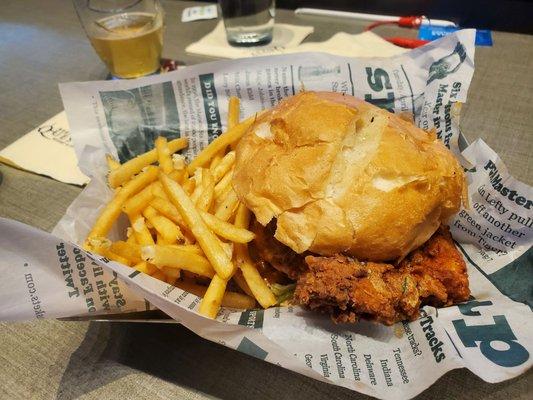 Buffalo chicken sandwich with garlic fries