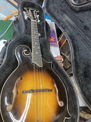 Serviced mandolin repaired major body crack and action setup.