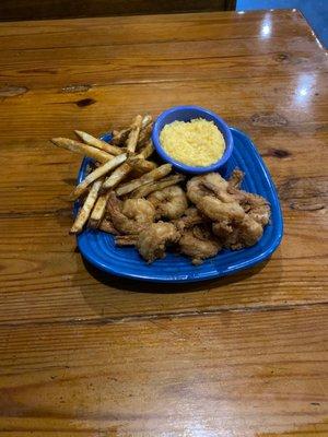 Fried shrimp with fries and grits