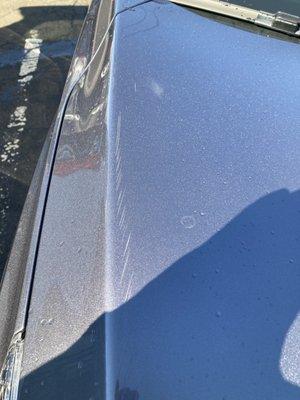 Brush scratches from Russell Speeder Car Wash in Milford.  Manager refuses to stand by their damage.