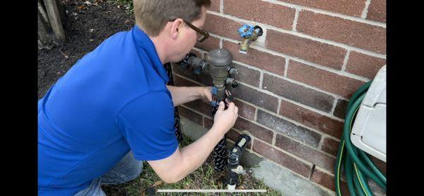 Insulating the PVB Backflow for the fall weather.  Also drained system so it's ready for winter.