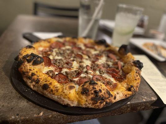 Homemade Lemon-Lime Soda and Margherita Pizza with Pepperoni and Sausage.