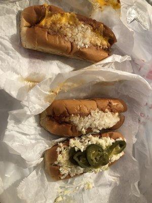 Chili cheese all the way, chilli dog all the way, slaw dog with pepper all the way  All the way = mustard and onions