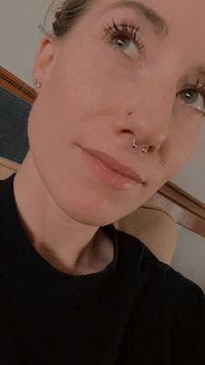 Nasal and septum piercing.