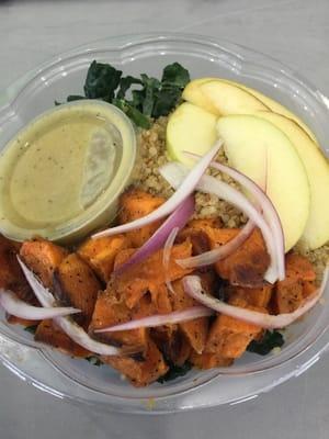 Kale & Quinoa Salad: kale, quinoa, roasted sweet potatoes, apples, red onion & Dijon vinaigrette.