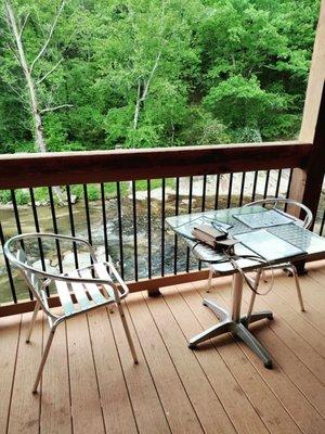 Deck seating on Roaring River by reminets of old mill.