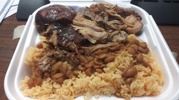 Roast pork with rice and beans.