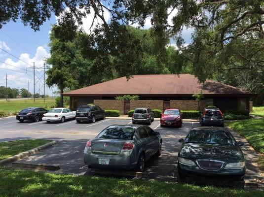 Outside Marion Dental Group under the shade trees on the east side