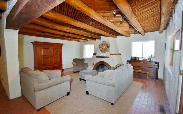 Originally very small Living Room with little natural lighting.  We added two windows on the sides of this fireplace.