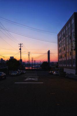 View of sunset on the corner facing the bridge.