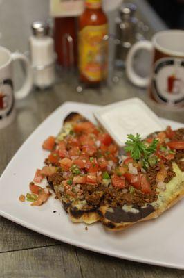 MOLLETES : TRADITIONAL MEXICAN BOLILLO BREAD, REFRIED BEANS FRESH PICO DE GALLO ASK FOR MEAT IF YOU LIKE