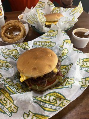 Our burgers with onion rings and side of the free BBQ beans