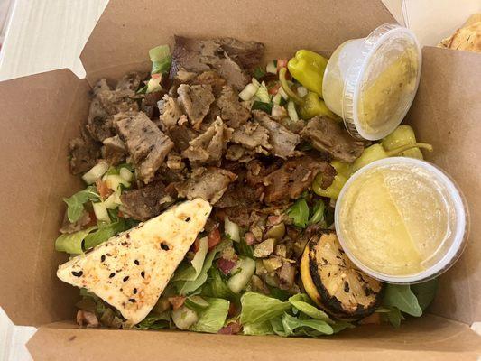 Greek salad with gyro meat.