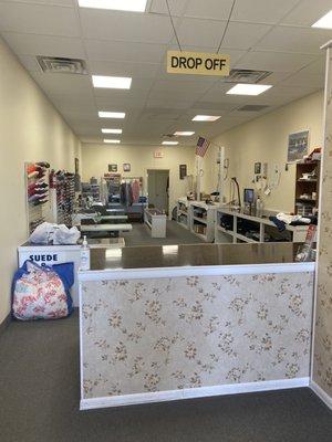 Clean, bright, organized work space (fitting room is to the right when you walk in)