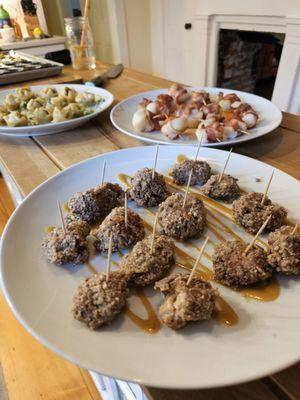 Beef wellington, scallops wrapped in bacon, and pecan crusted chicken bites