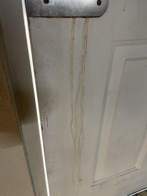 Rust water stains on door.