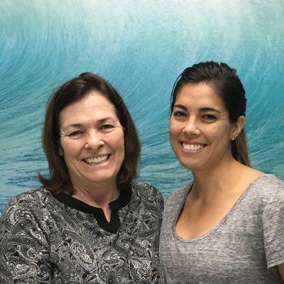 Robyn and her daughter in the massage room.