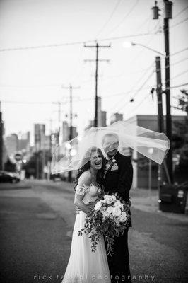 I love shooting family and wedding party photos in the alley. The city on the background looks great.