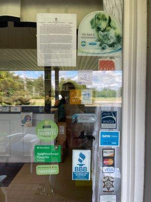 The stickers on the door tell the story about our efforts to give your pet the best care.